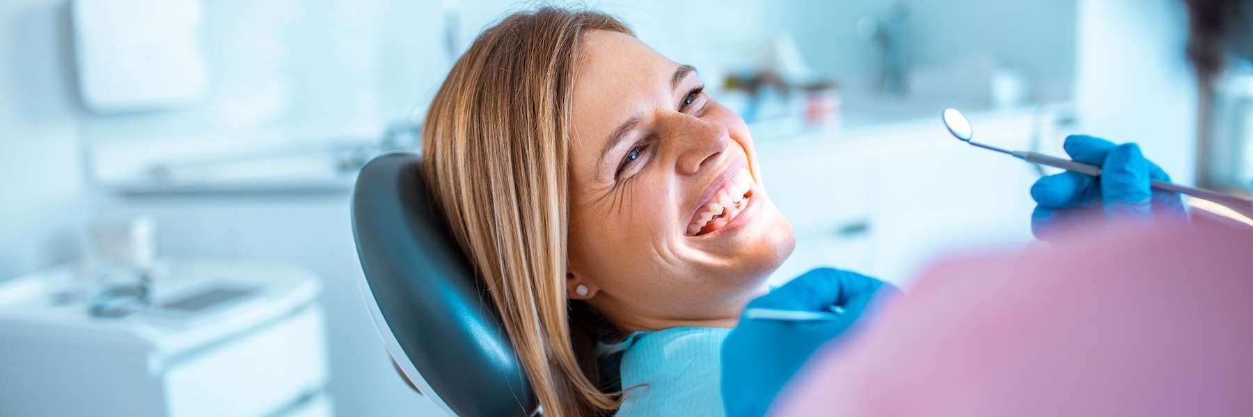 woman sitting in a dental chair