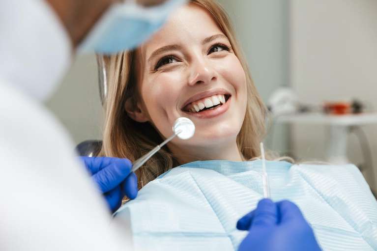 woman sitting in a dental chair
